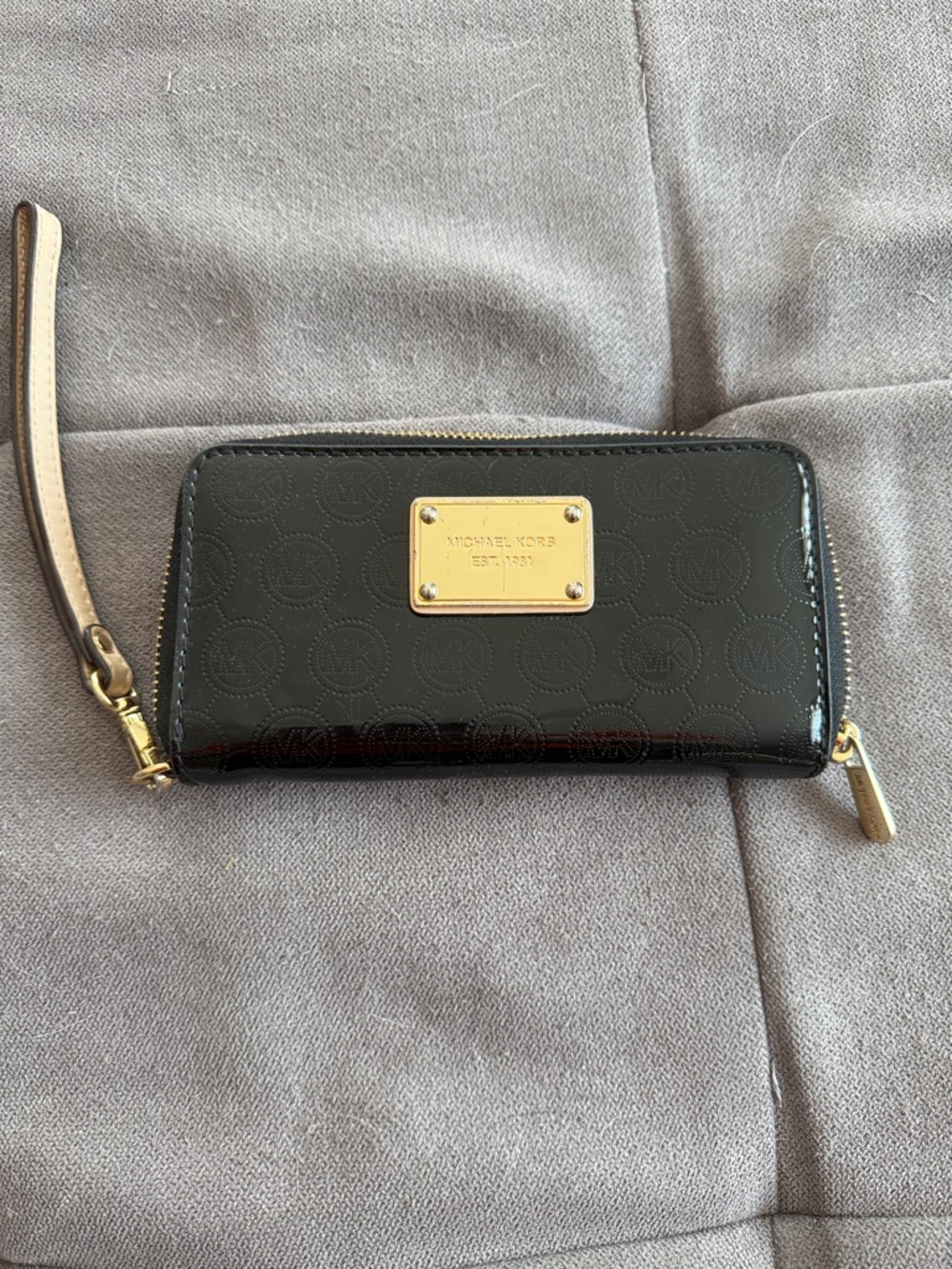 Michael Kors Black Patent Leather Wristlet with Gold Plaque